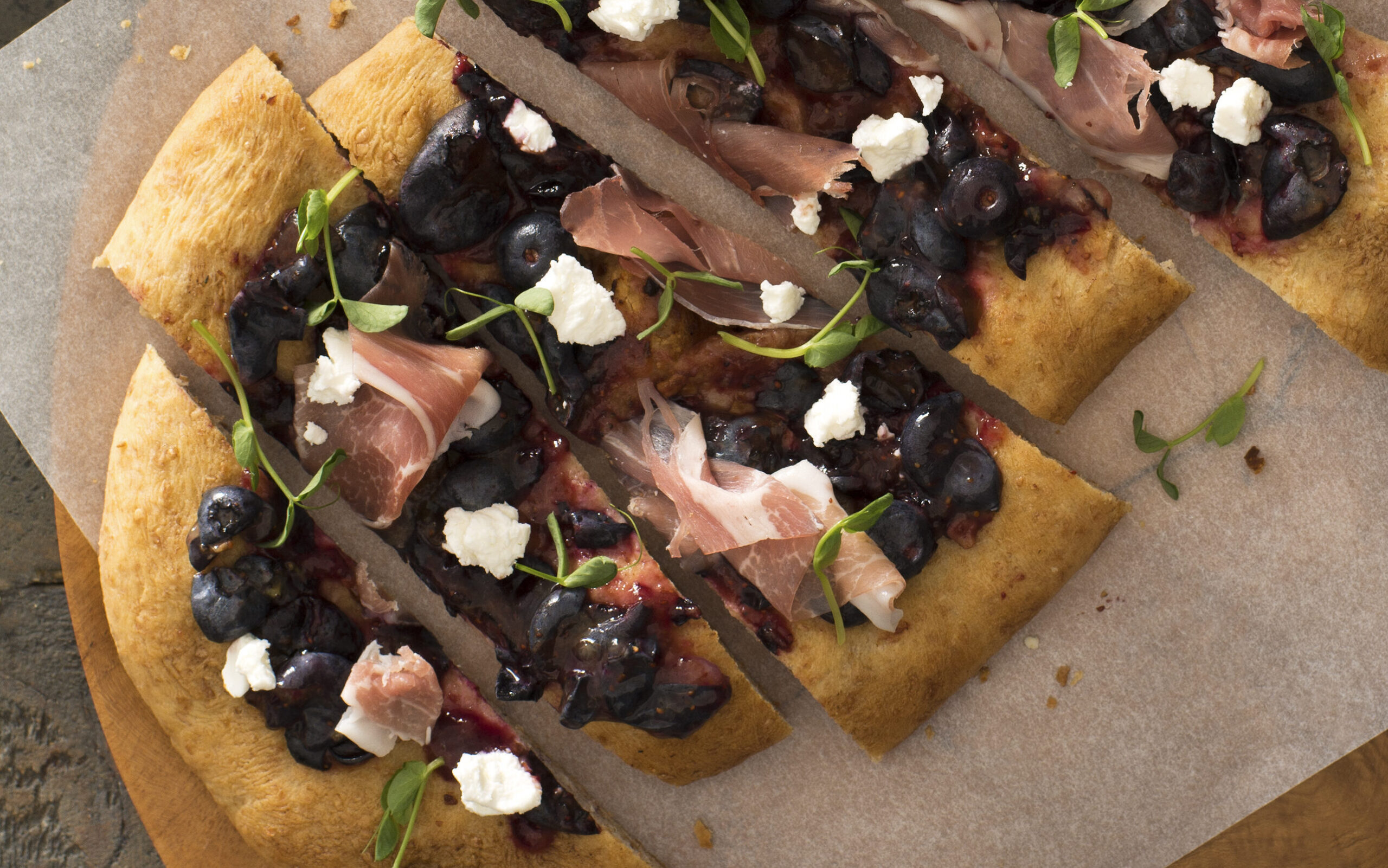 Recipe Image - Blueberry, Prosciutto and Goat Cheese Flatbread